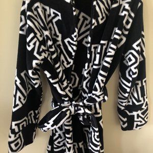 black and white vs pink fuzzy bath robe